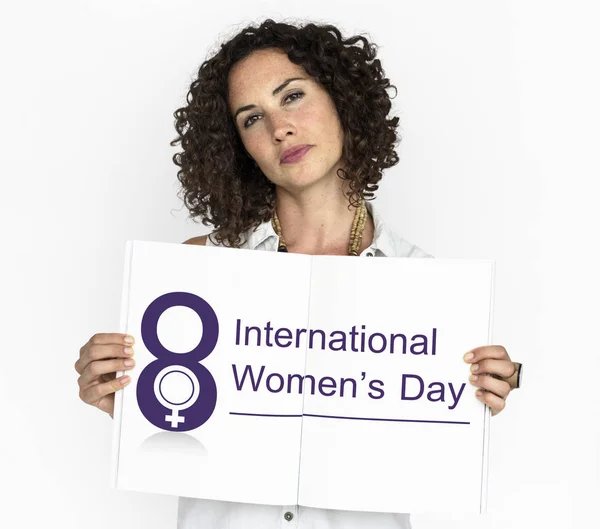 Confident woman holding banner — Stock Photo, Image