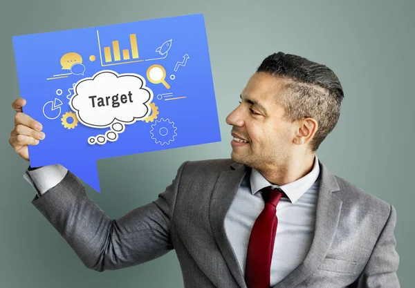 Business man holding speech bubble — Stock Photo, Image