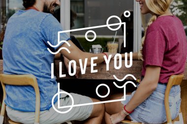 Kafe mekanlarda oturan Çift