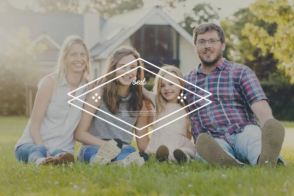 Familie entspannt im Gras — Stockfoto