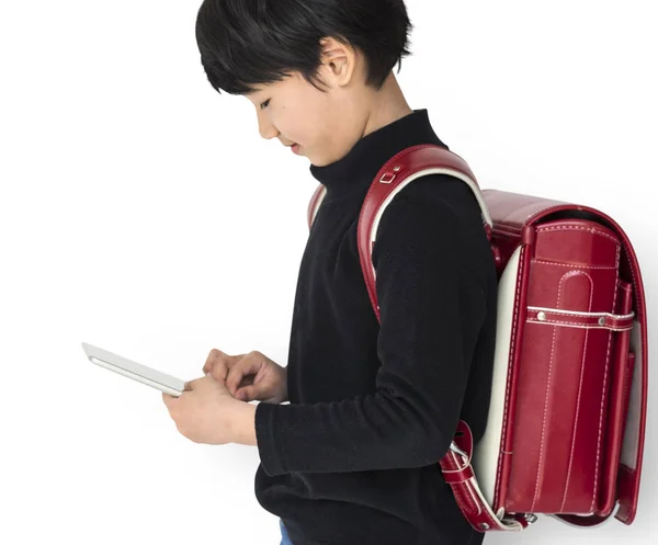 Asiatico ragazzo utilizzando digitale tablet — Foto Stock