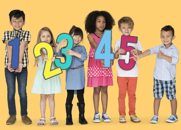 Kids holding Paper Numbers — Stock Photo, Image