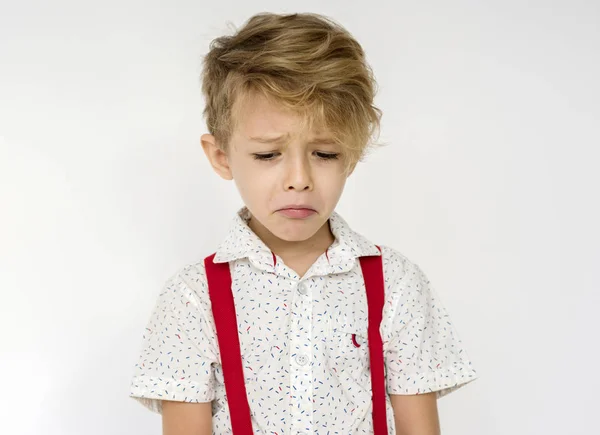 Kid s výrazem nešťastný obličej — Stock fotografie