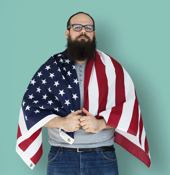 Hombre sosteniendo bandera — Foto de Stock