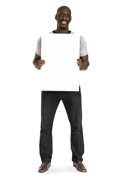 Homem africano segurando banner em branco — Fotografia de Stock