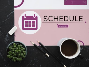 kahve fincanı ve yeşil bitki içeren tablo