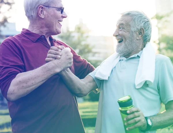 Senior people exercising together — Stock Photo, Image