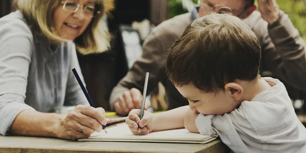 Grandparents and grandson drawing — Stock Photo, Image