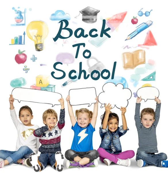 Children holding speech clouds — Stock Photo, Image