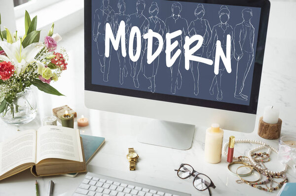 table with flowers and computer