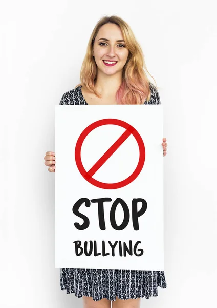 Smiling woman holding banner — Stock Photo, Image