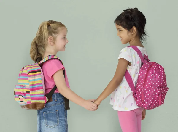 Little girls Holding hands Stock Picture