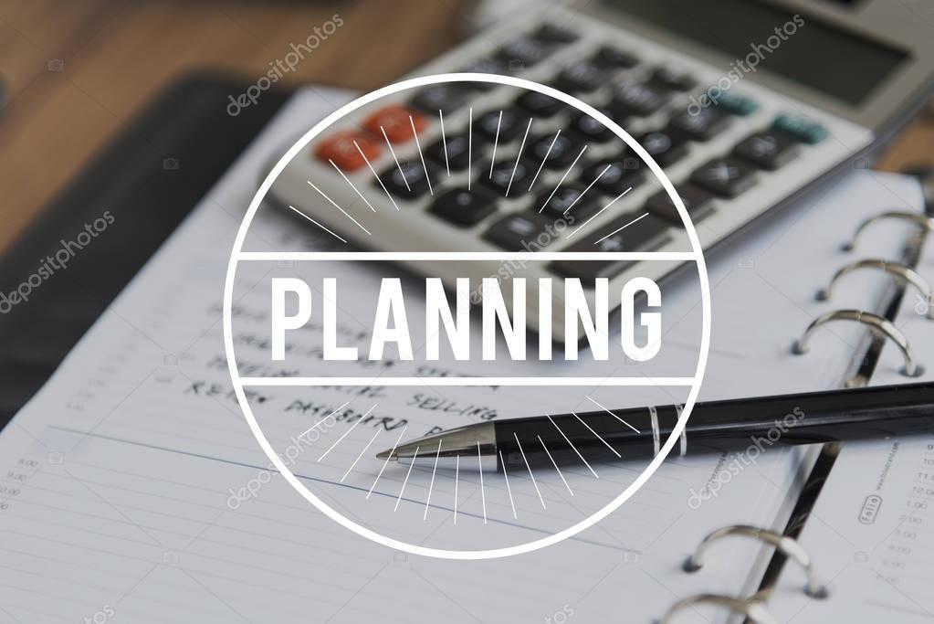 Workplace table with calculator, diary and pen, management organization and finance concept, title: Planning