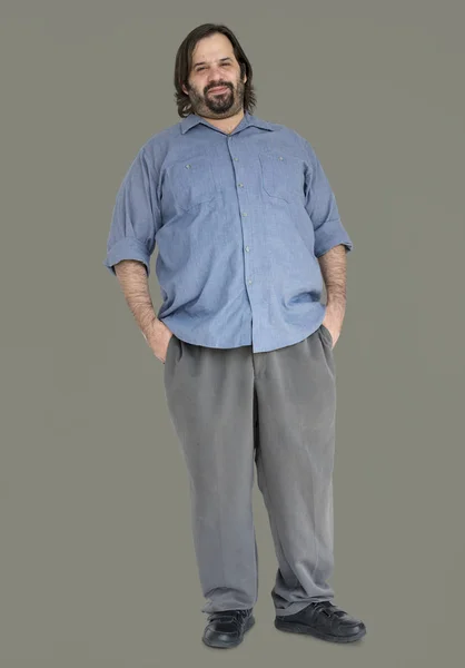 Man standing with hands in pockets — Stock Photo, Image