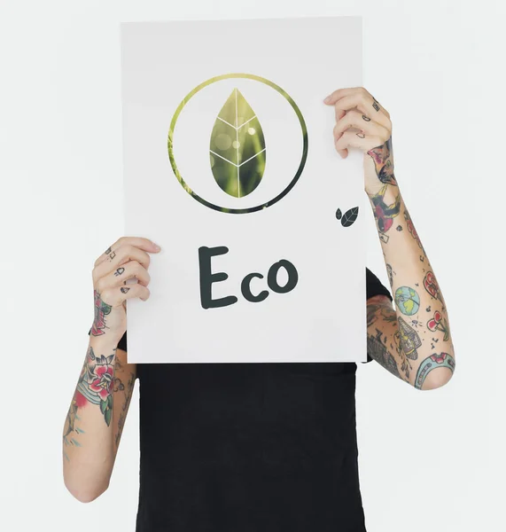 Tattooed person holding banner. — Stock Photo, Image