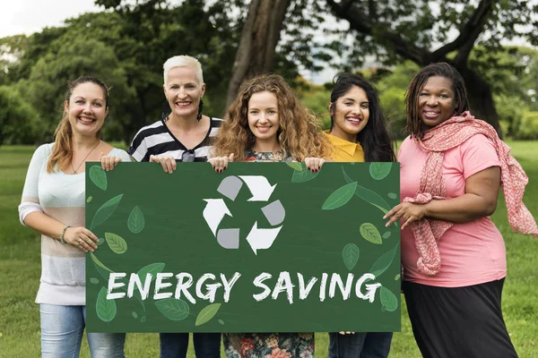 Five smiling women holding banner — Stock Photo, Image