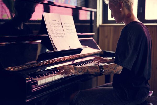 Musician playing on the Piano