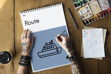 Dövmeli kişi Not Defteri'nde çizim