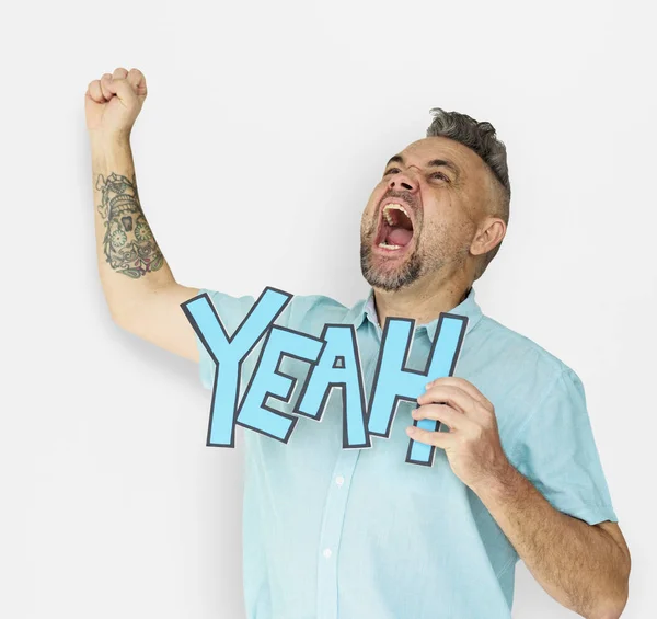 Muž křičí pozitivní slovo Ano — Stock fotografie