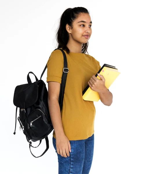 Menina segurando escola livro didático — Fotografia de Stock