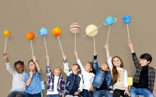 Children Holding solar system — Stock Photo, Image