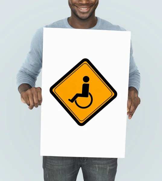 Afrikaanse man met grafische banner — Stockfoto