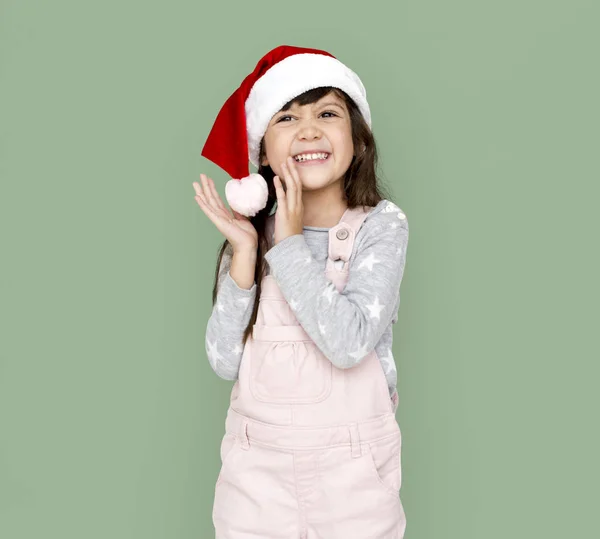 Malá holčička v klobouku Santa Claus — Stock fotografie