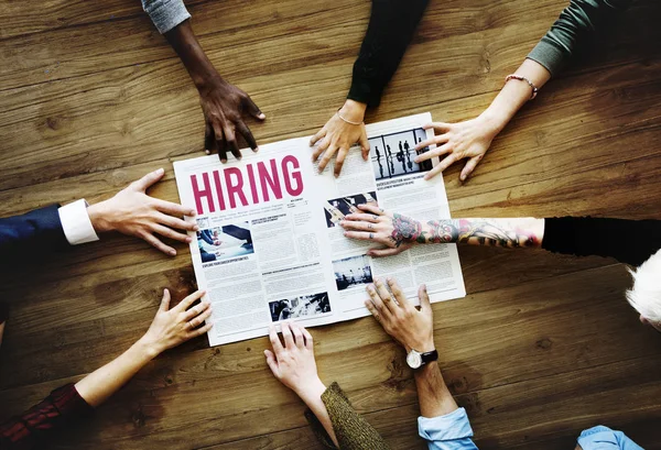 Hands Reach Out for Newspaper — Stock Photo, Image