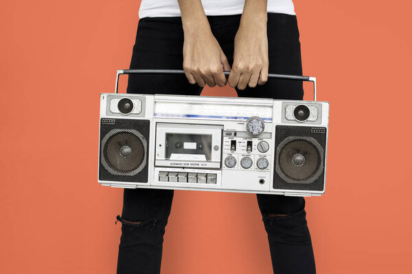 woman holding radio