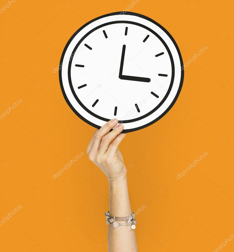 Hand Holding Clock