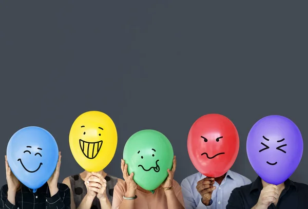 People standing with balloons — Stock Photo, Image