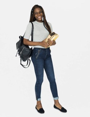 kız öğrenci holding ders kitabı