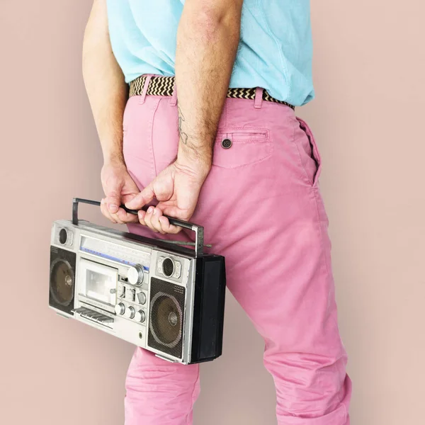 Man holding  jukebox — Stock Photo, Image