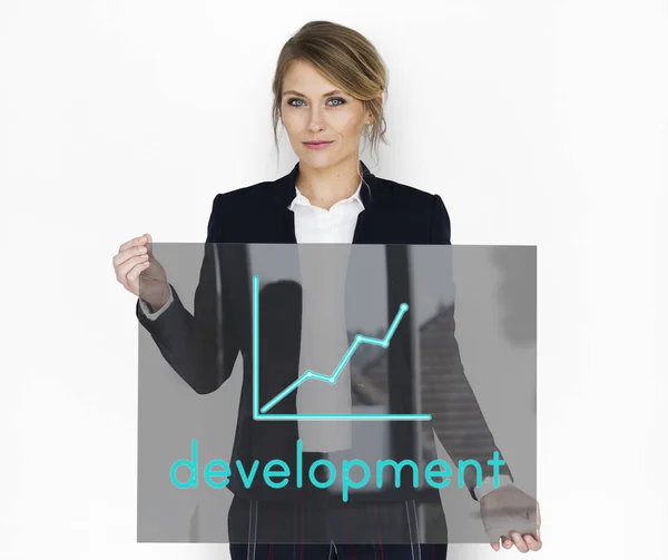 Kobieta biznesu trzyma plakat szklany — Zdjęcie stockowe