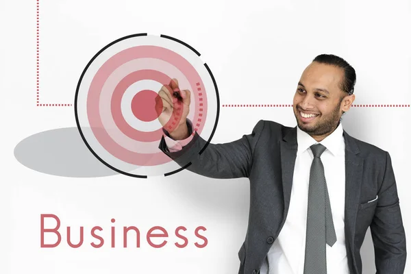 Business man writing in studio — Stock Photo, Image