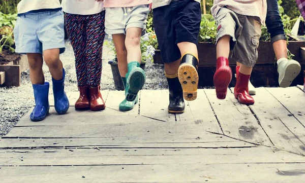 Kids wearing rubber boots — Stock Photo, Image