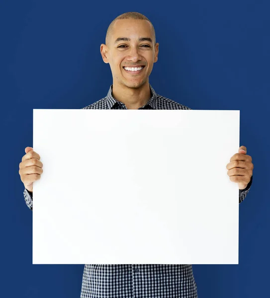 Man holding empty white placard — Stock Photo, Image