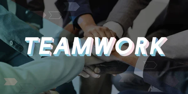 Woord teamwork met Verenigde handen van ondernemers — Stockfoto