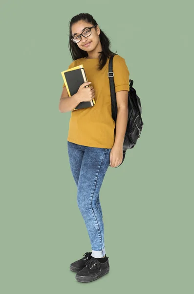 Indian student holding textbook — Stock Photo, Image