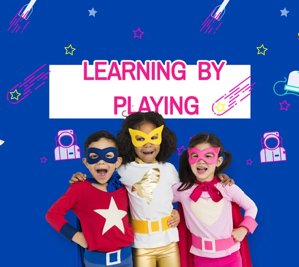 Children wearing superhero costumes — Stock Photo, Image