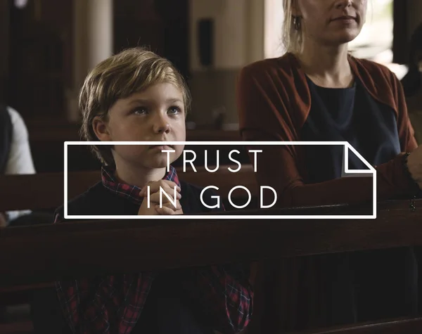 Boy praying in the Church — Stock Photo, Image