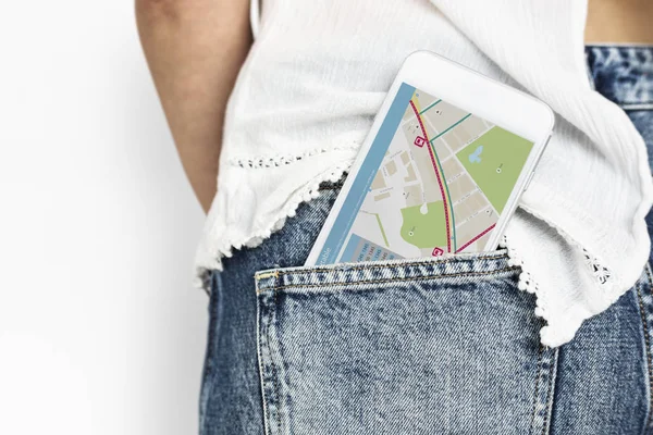 Smartphone in pocket of female jeans — Stock Photo, Image