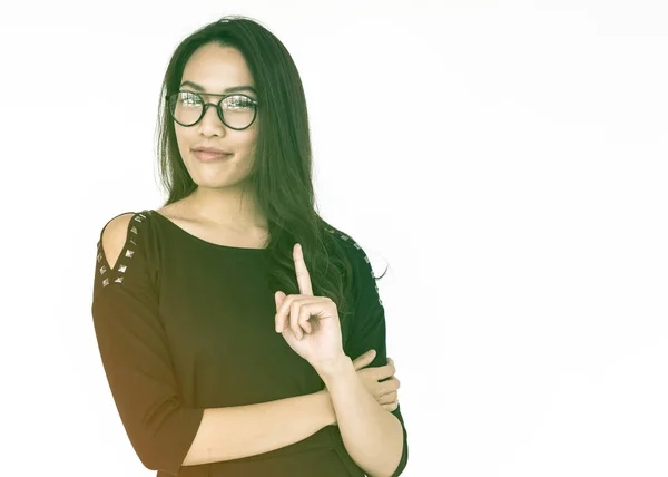 Mujer señalando con fonger en el estudio —  Fotos de Stock