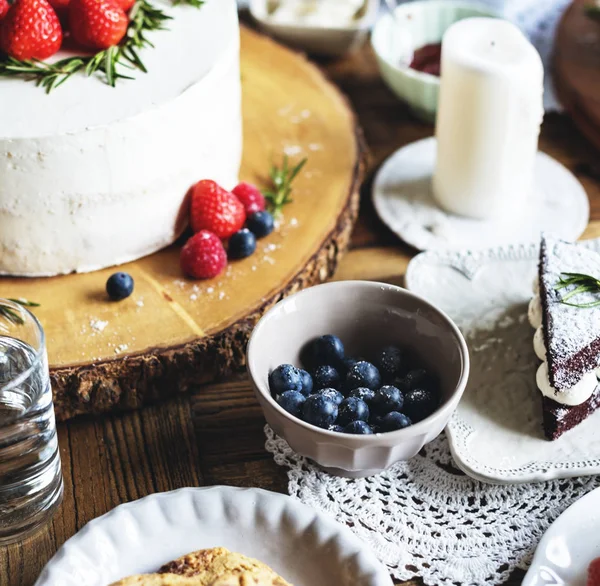 Celebration table with cake — Stock Photo, Image