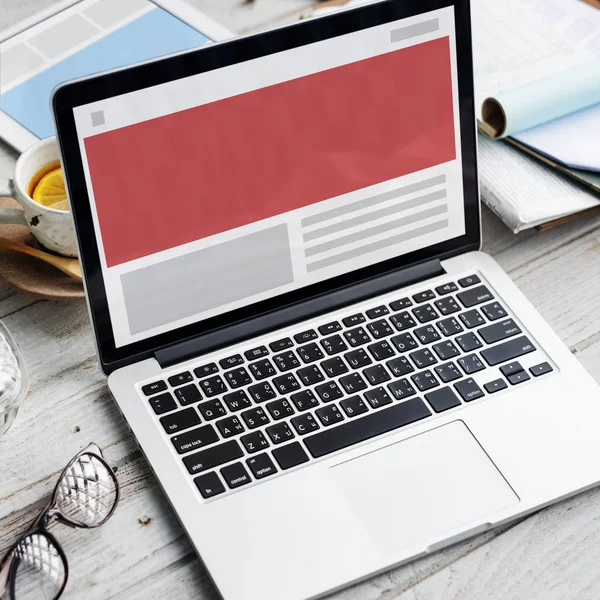 Opened laptop on wooden table — Stock Photo, Image