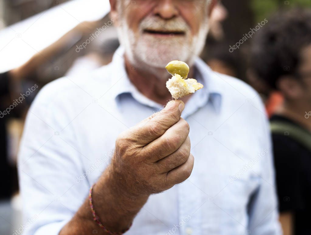 Man Showing Bread 