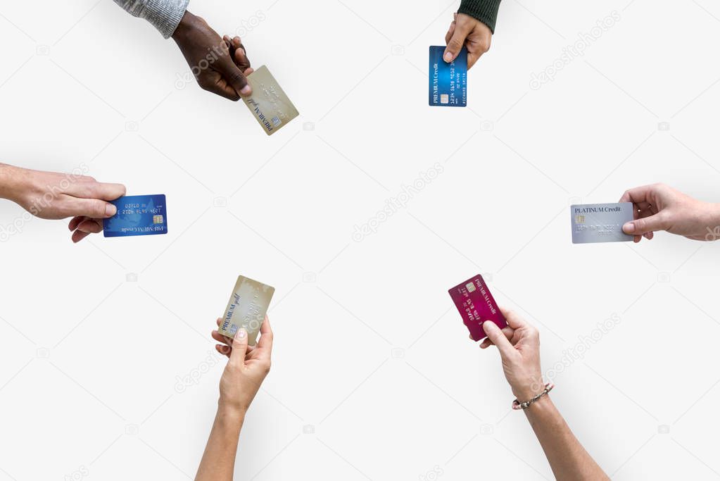 hands holding credit cards