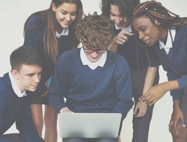 Students using laptop — Stock Photo, Image