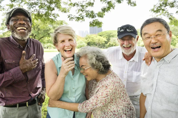 Healthy senior people laughing outdoors — Stock Photo, Image