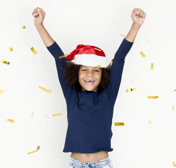 Menina no chapéu de Papai Noel — Fotografia de Stock